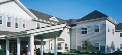 Brookdale Cape Cod exterior with covered entry and a multi-wing building
