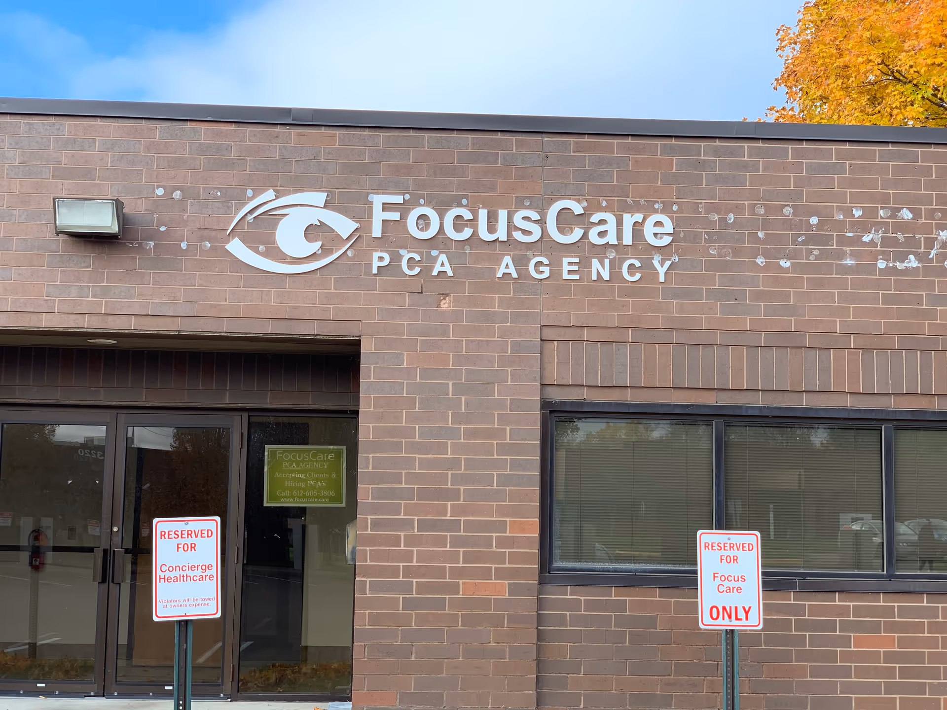 Brick exterior of FocusCare PCA Agency with entrance doors and signage.