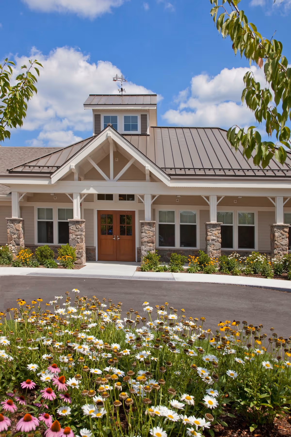 Front view of Bridges by Epoch at Lexington with landscaped entrance
