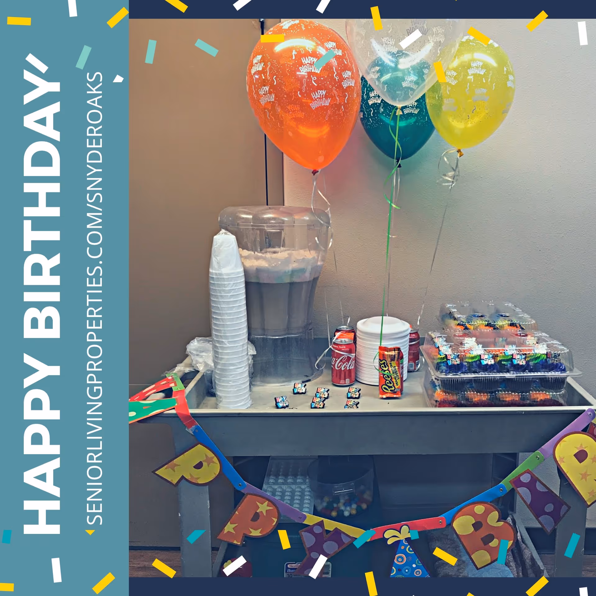Birthday celebration setup with balloons, cake, drinks, and cupcakes on a party table.