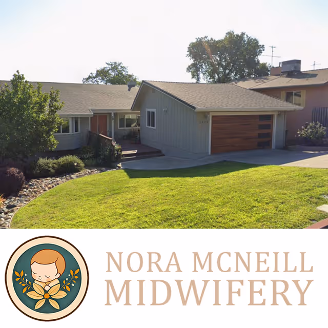Front exterior view of a single-story house with a two-car garage, lawn, and large watermark logo.
