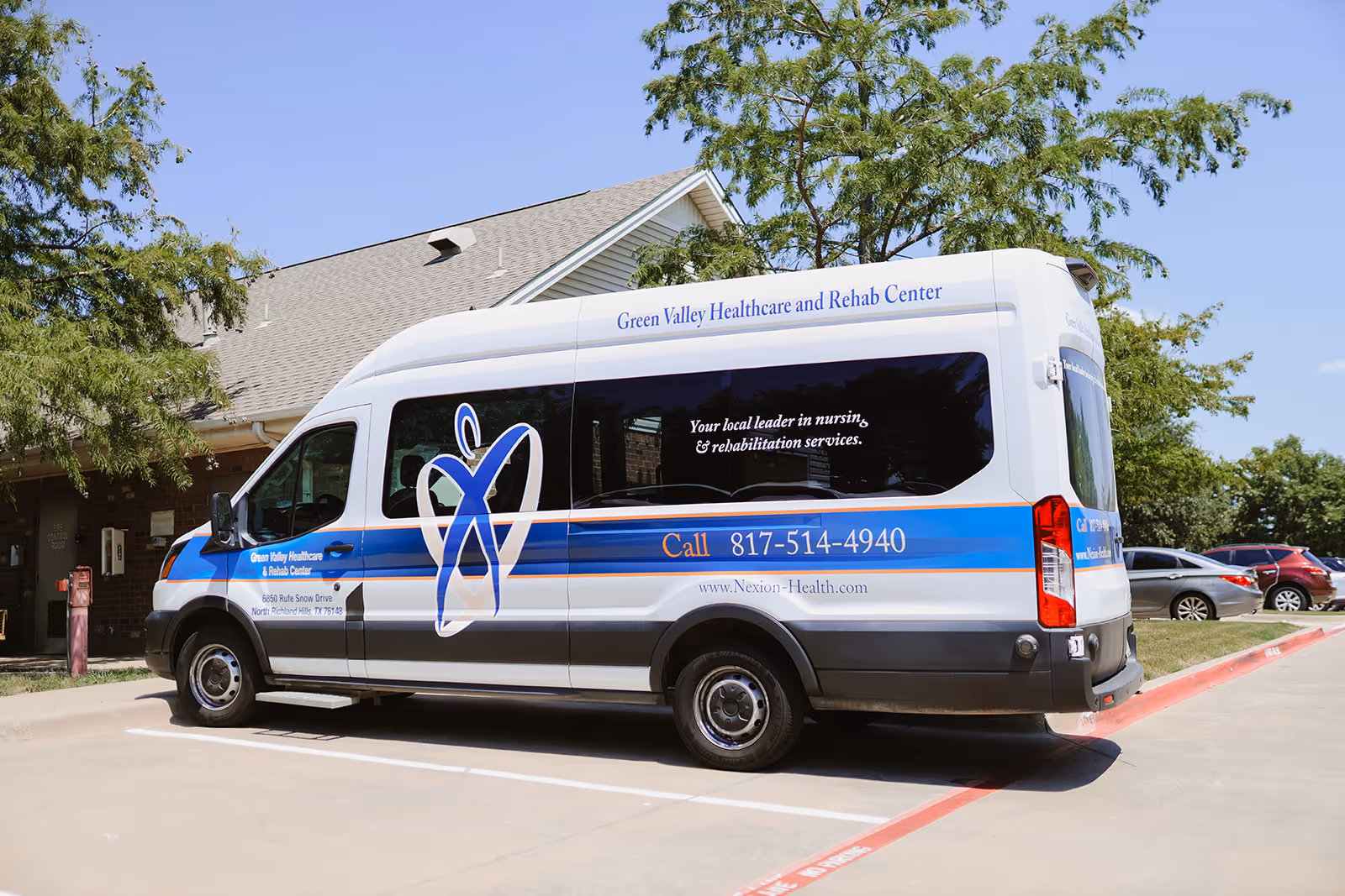 Exterior view of Green Valley Healthcare van parked outside the rehabilitation center.