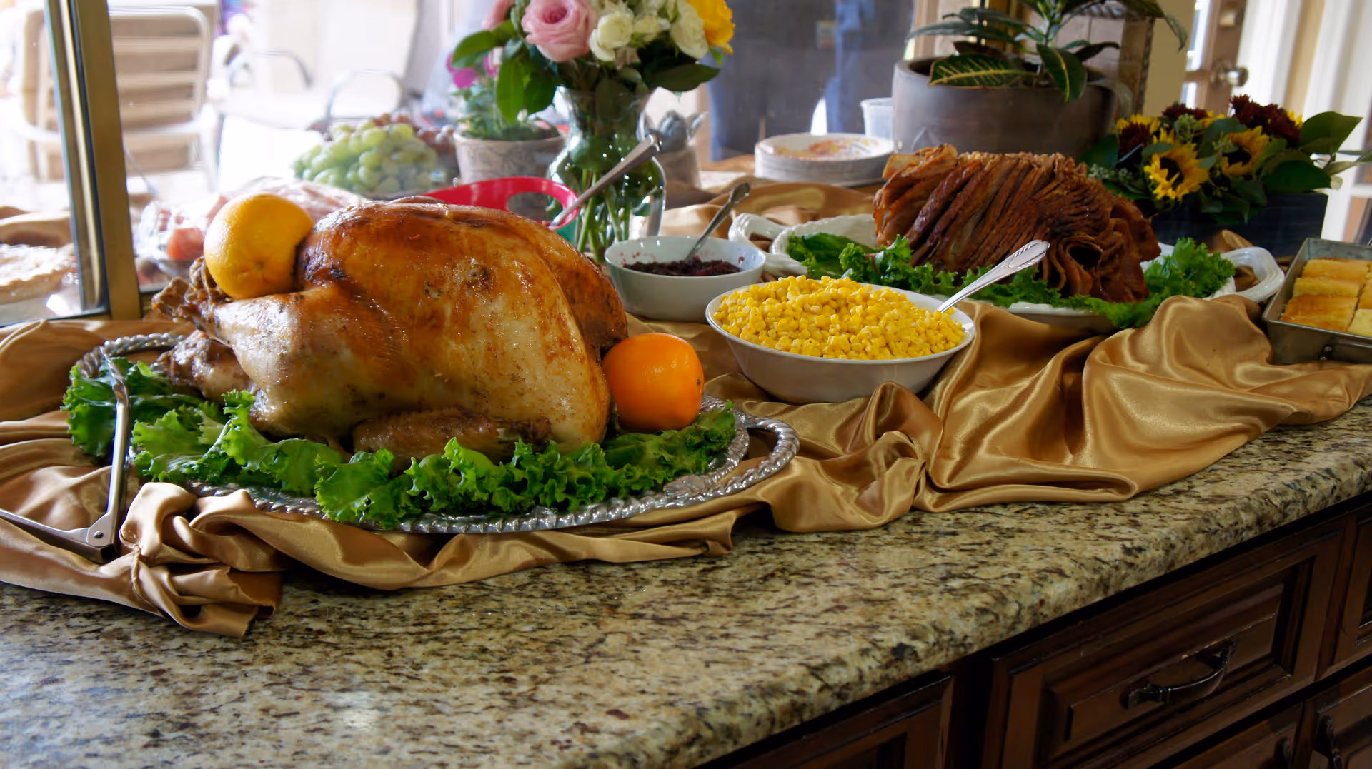 Festive Thanksgiving feast on a granite kitchen counter at North Ranch Assisted Living Home.