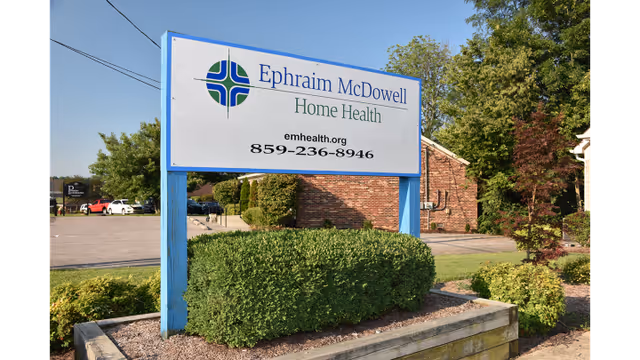 Outdoor view of Ephraim McDowell Home Health sign with brick building and landscaping