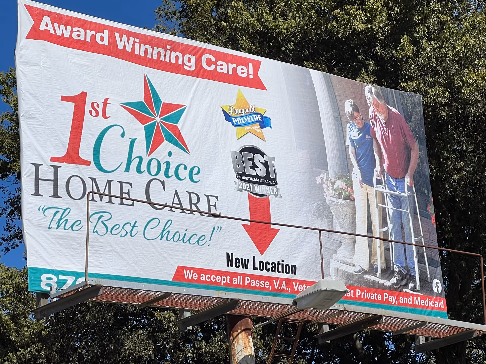 Large outdoor billboard for 1st Choice Home Care Newport featuring seniors and slogans.