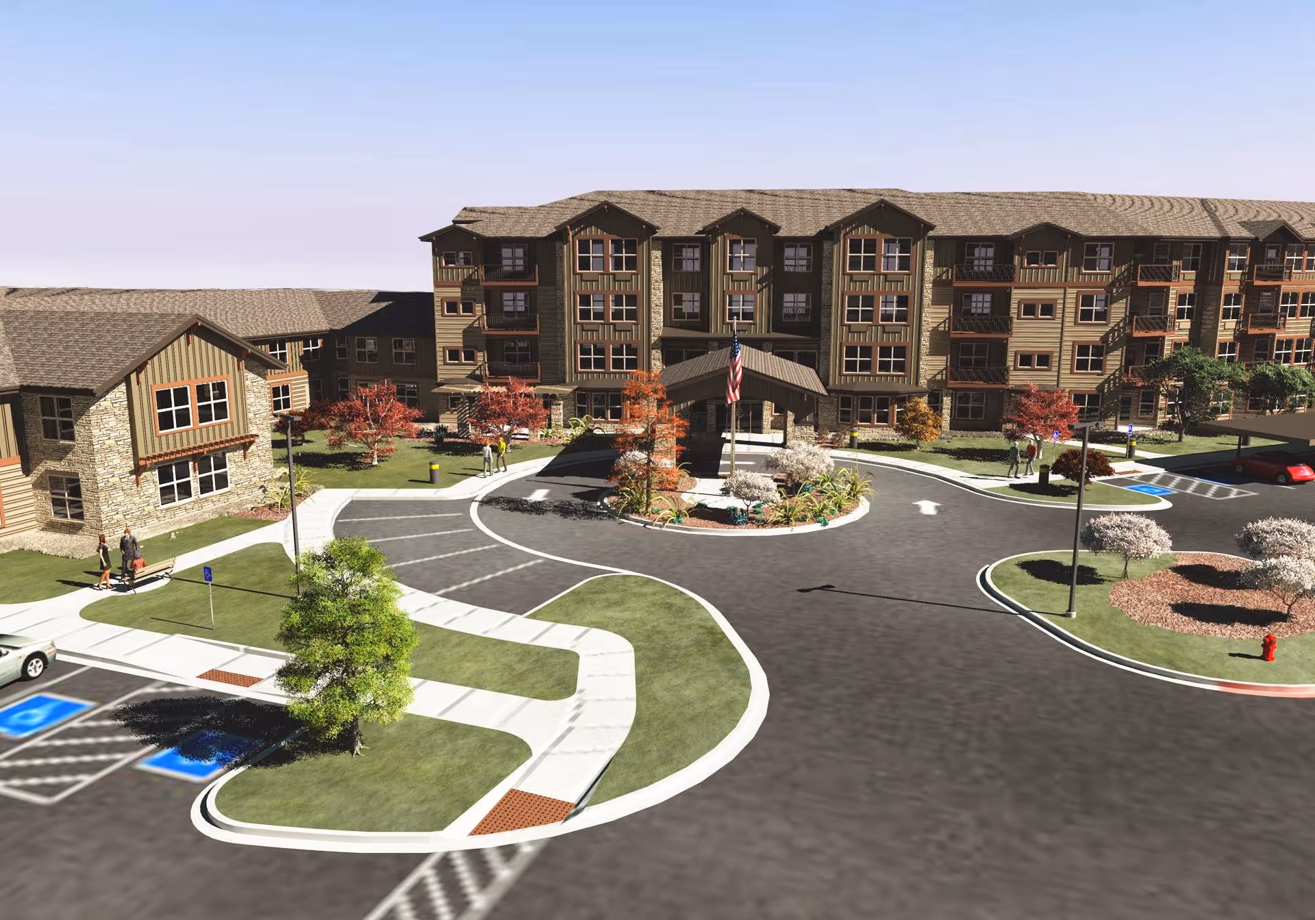 Front exterior of a multi-story senior living building with a circular driveway, landscaped islands, and an American flag.
