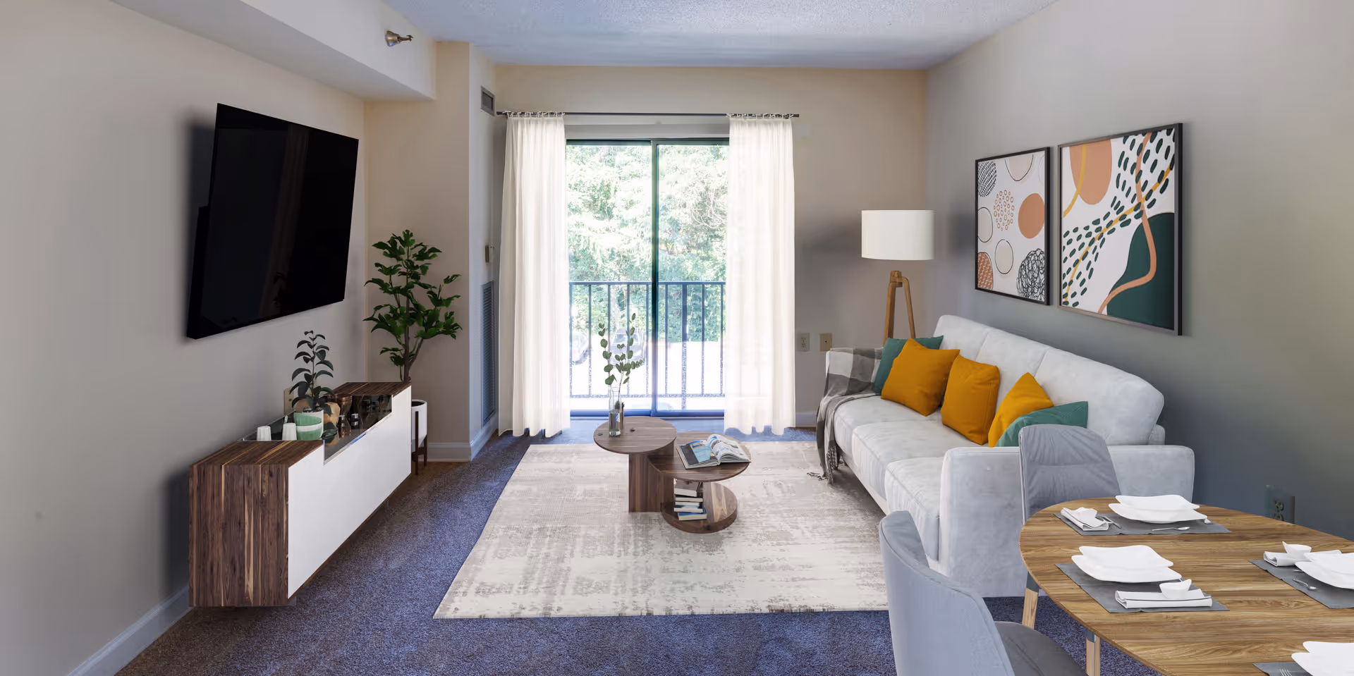 Bright, modern living room with sofa, coffee table, TV, and sliding balcony doors.