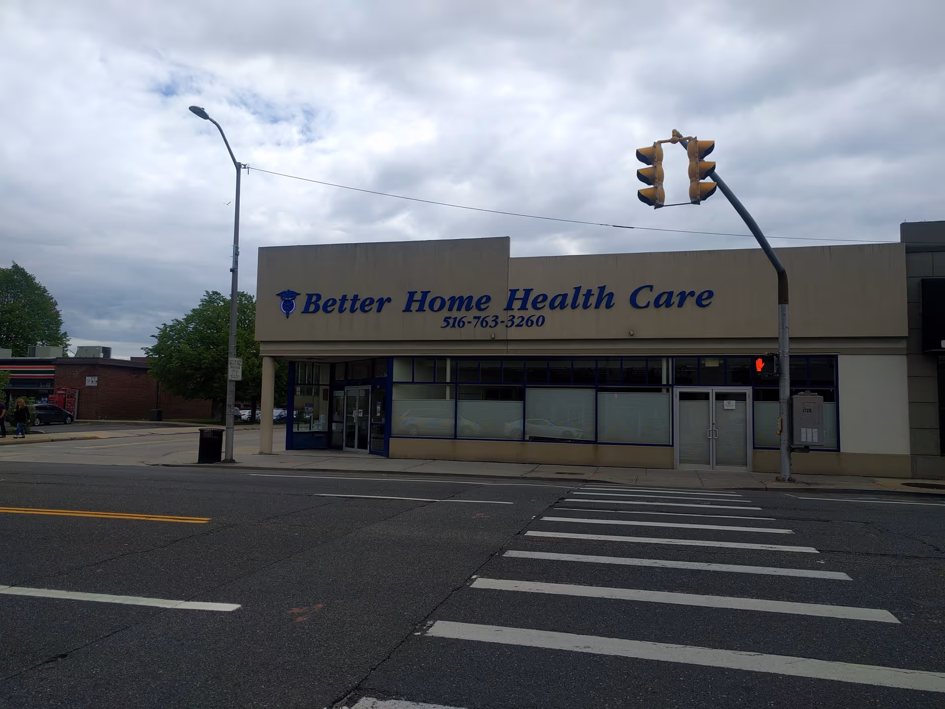 Exterior view of the Better Home Health Care storefront on a street corner.