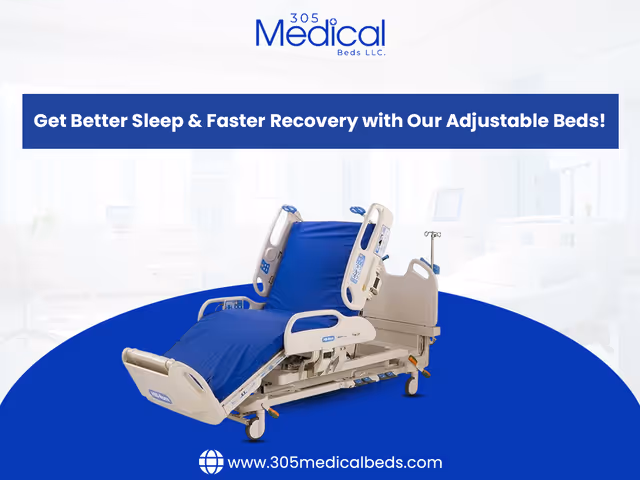 Adjustable hospital bed with blue bedding in a bright clinical interior.