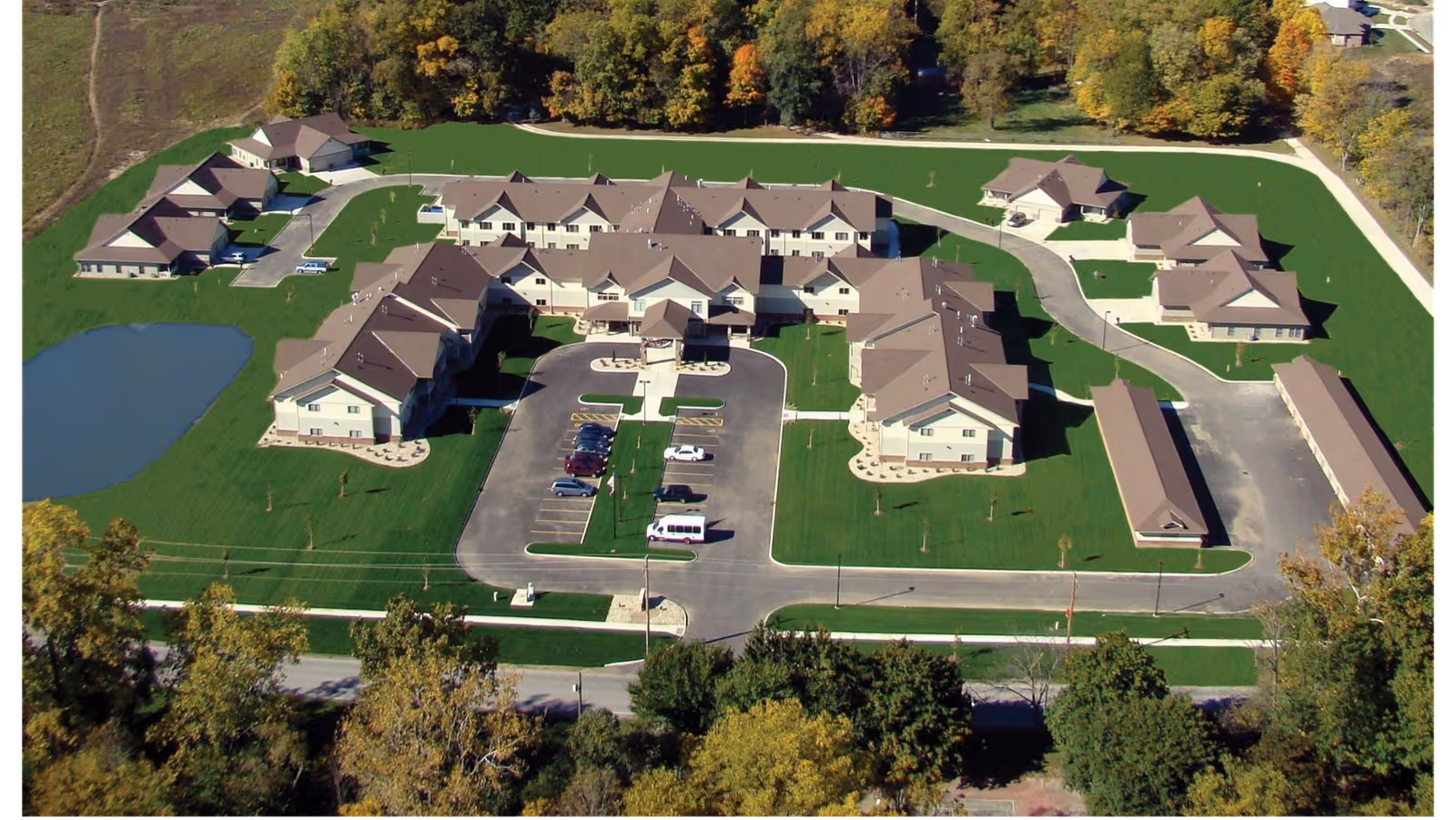 Aerial view of a Primrose Findlay senior living campus with multiple buildings and parking.