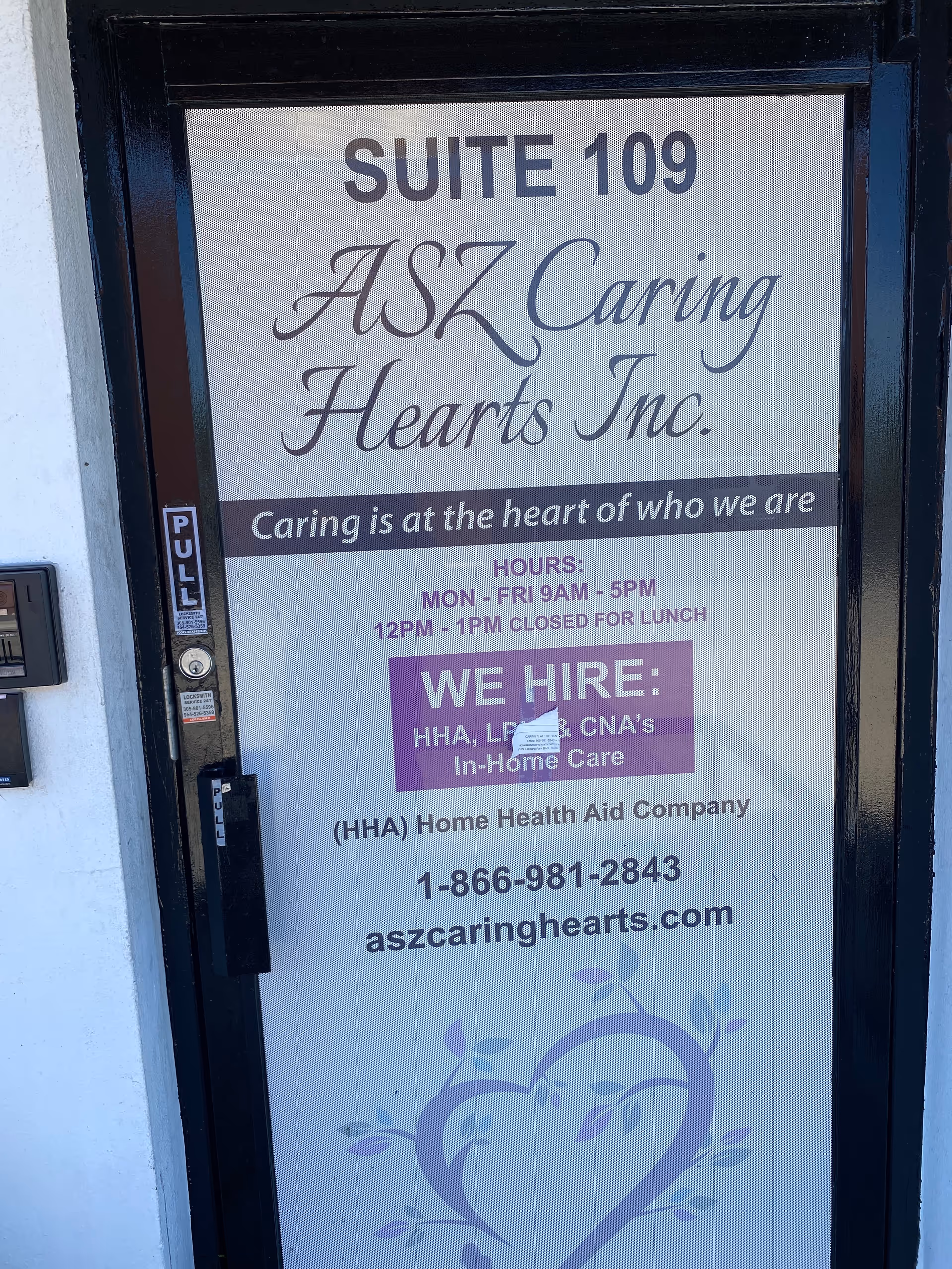 Exterior door displays Suite 109 and ASZ Caring Hearts Inc. signage and contact info.