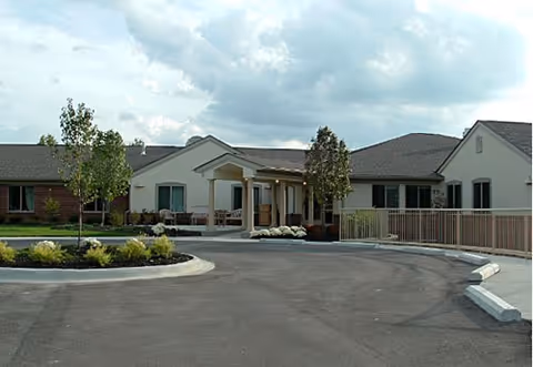 Front exterior of a Willow Brook Christian Home facility with driveway and entrance.