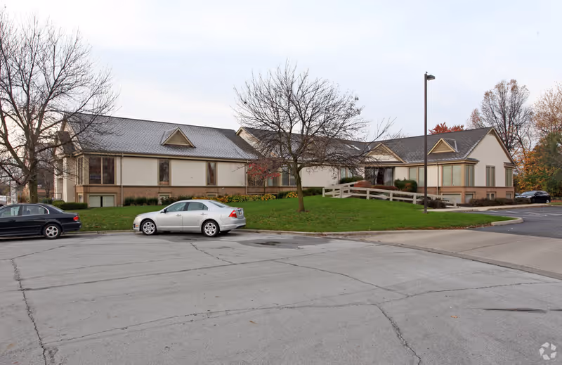 Exterior view of Elite Home Health Care Services LLC facility, single-story building with a parking lot.