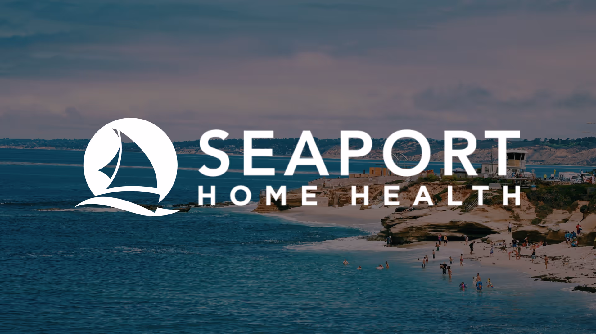 Coastal seascape with rocky shoreline and Seaport Home Health logo across the scene.