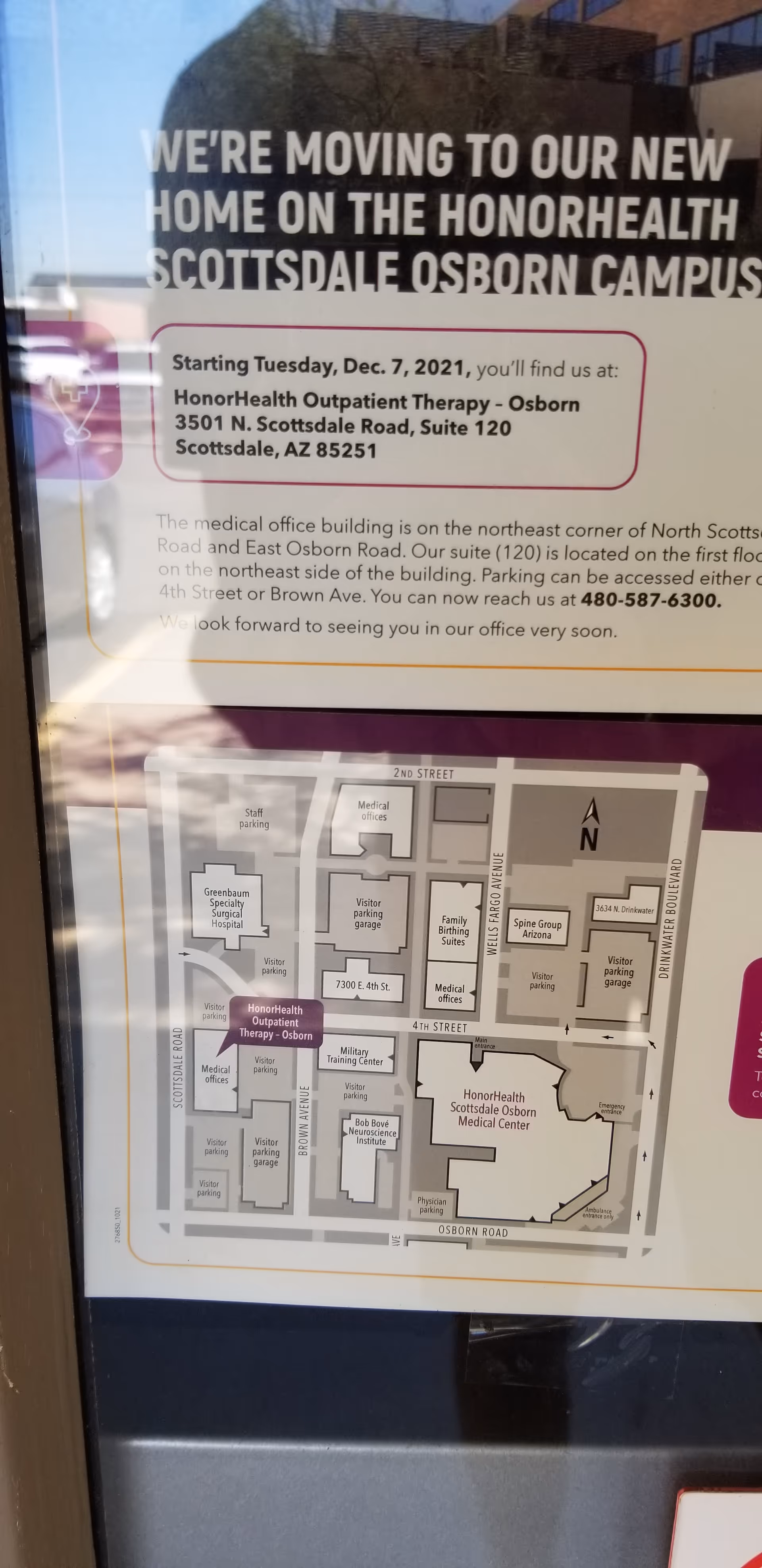 Poster on glass door advertising relocation with a campus map for HonorHealth Osborn.