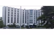 Saint Joseph Villa exterior: a large white multi-story building with a curved central tower.
