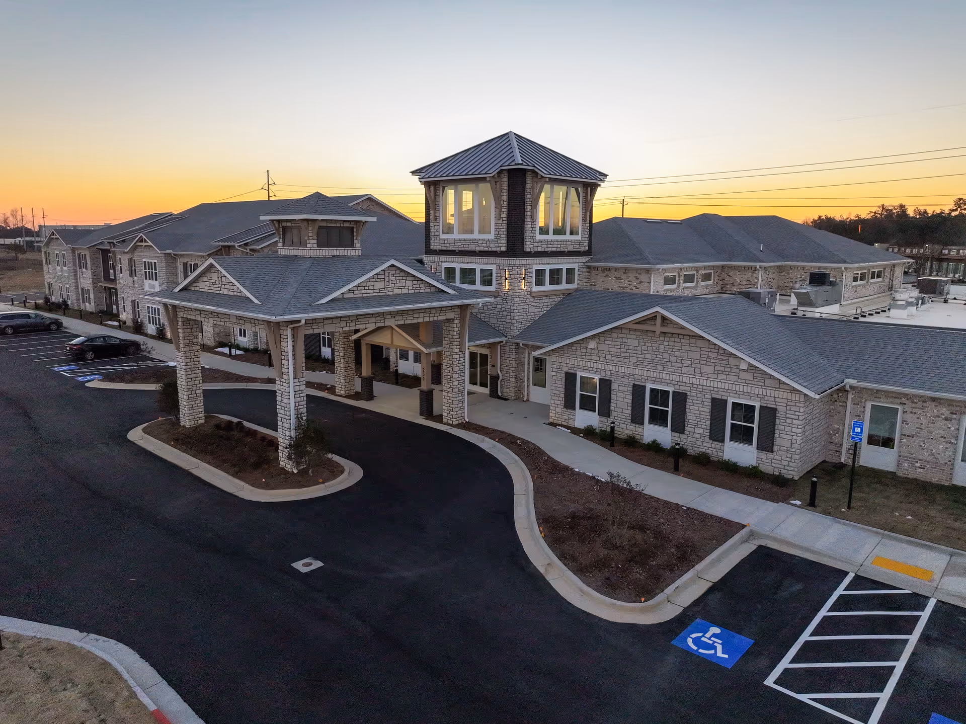 A wide exterior view of Canopy at Westridge, showing the covered entrance.