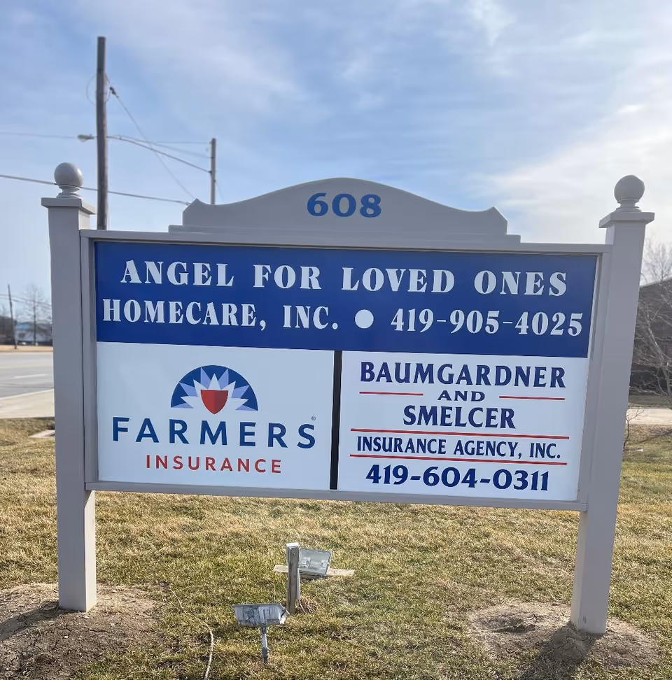 Outdoor sign for Angel for Loved Ones Homecare, Inc. with insurance logos.