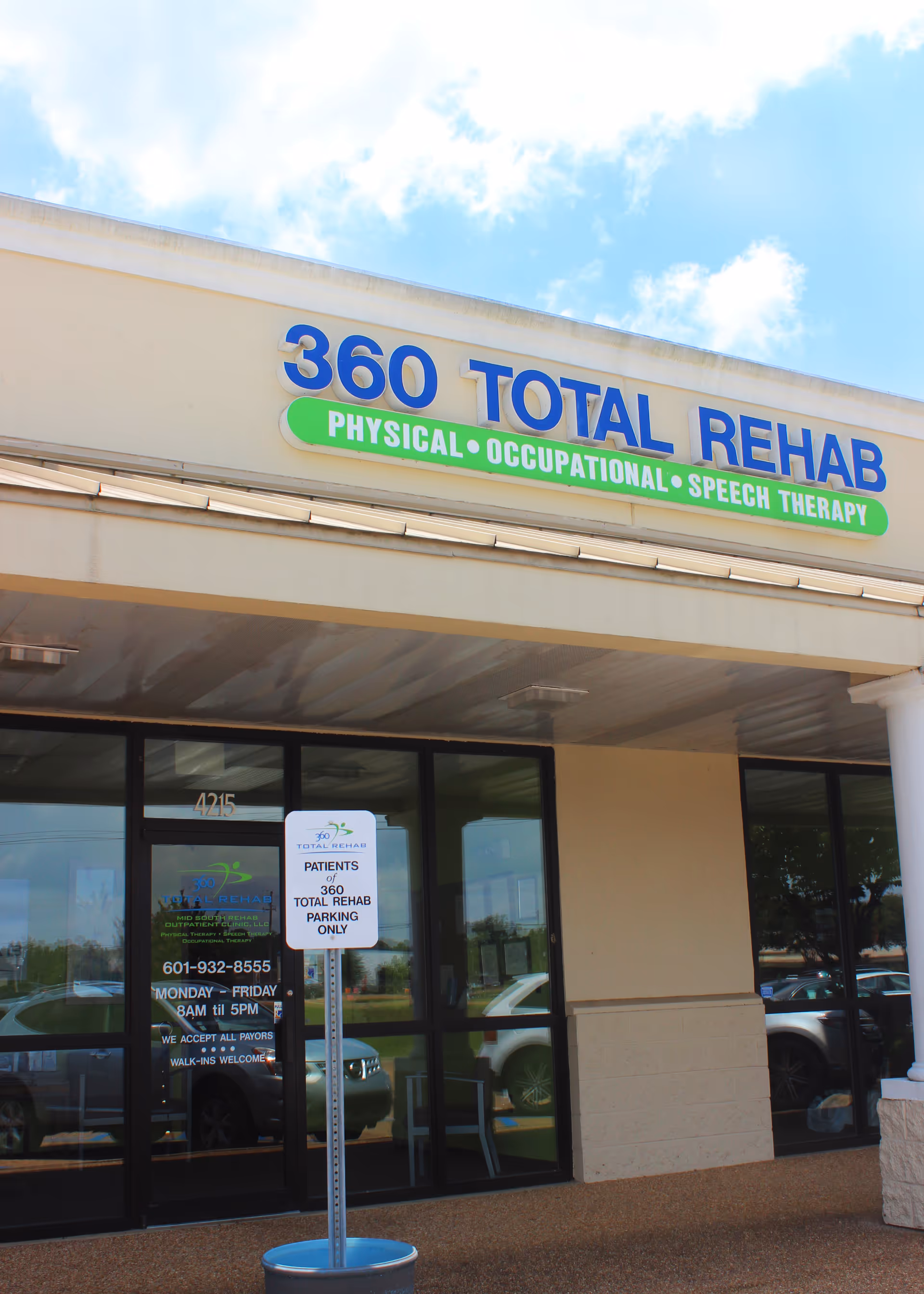 Front exterior of rehab facility with a large blue 360 TOTAL REHAB sign.