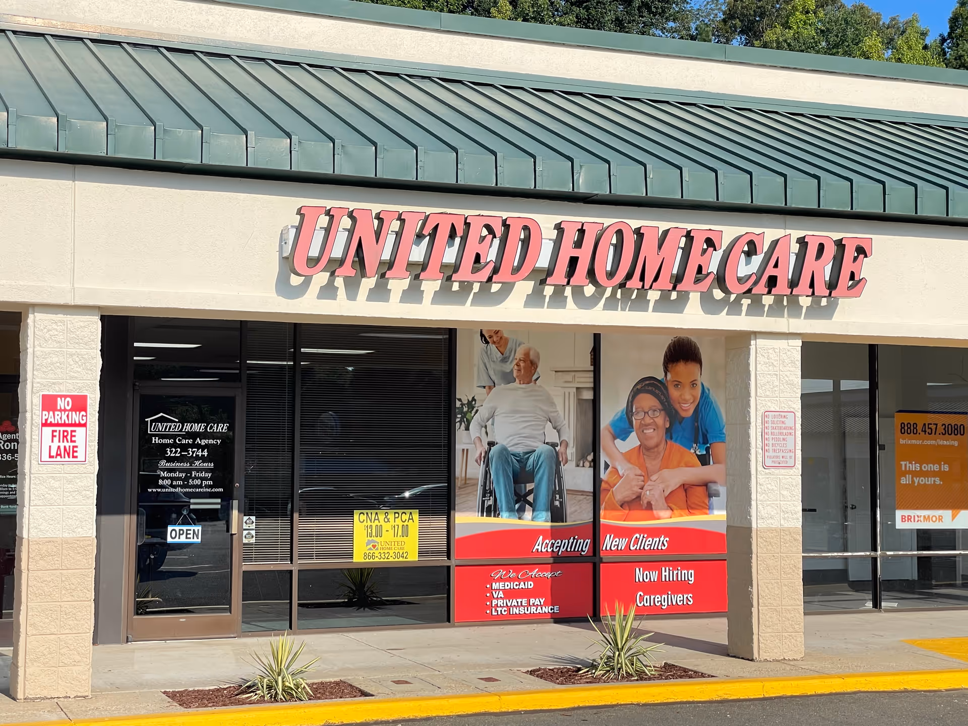 Front view of United Home Care storefront with large sign and caregiver posters.