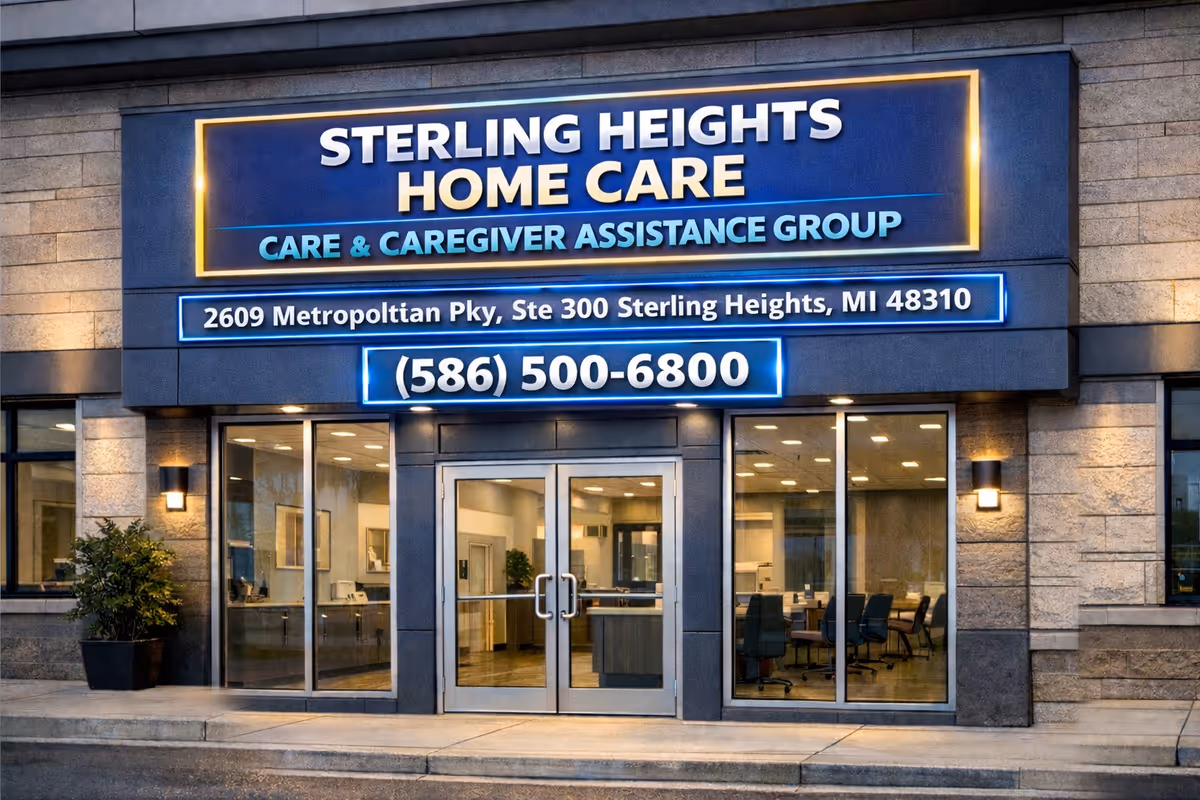 Exterior view of Sterling Heights Home Care entrance with illuminated sign and glass doors.