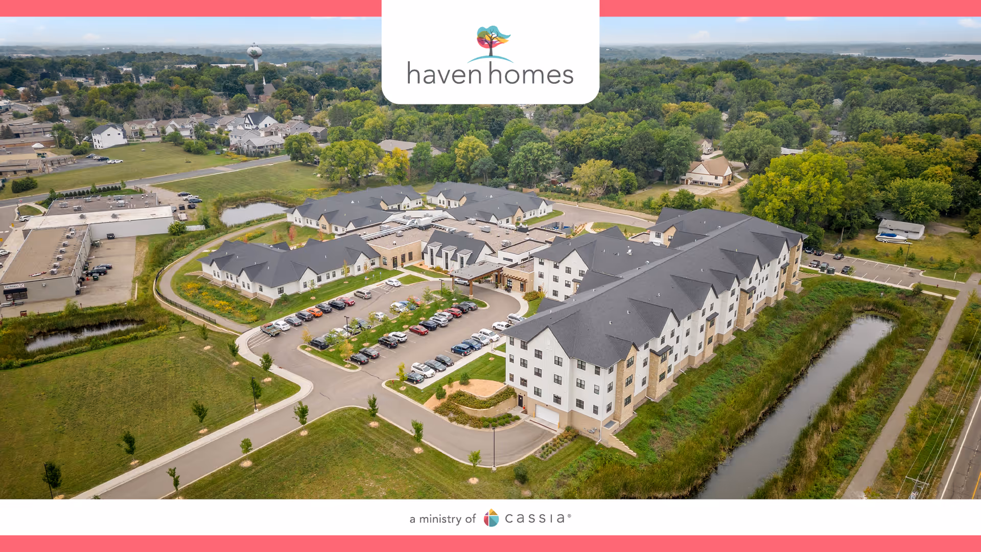 Aerial view of Haven Homes Assisted Living campus showing interconnected buildings, parking lots, and green surroundings.