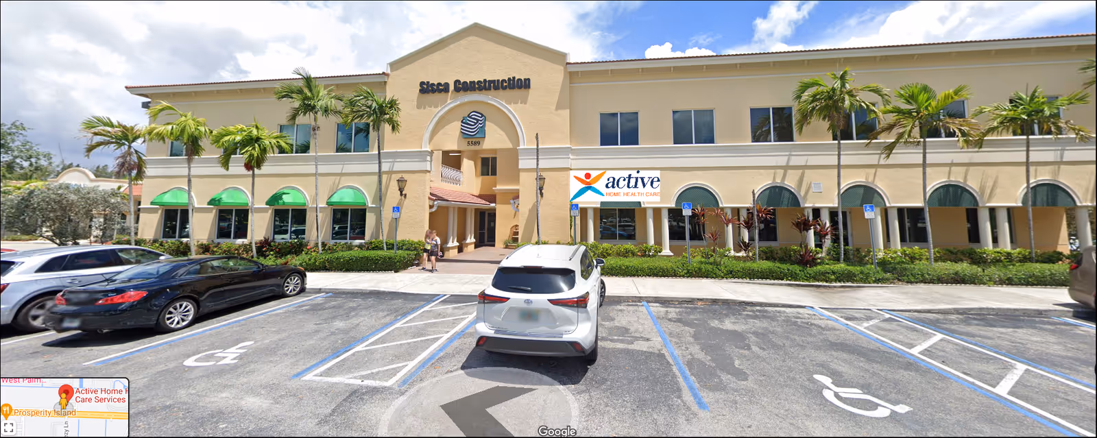 Exterior view of Active Home Health Care Services building with palm trees and parked cars.