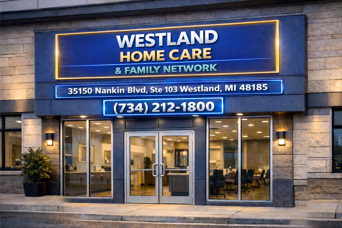 Front of Westland Home Care and Family Network building with illuminated sign and glass doors.