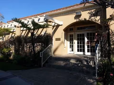 Entrance to Country Villa Rehabilitation Center with double doors and stairs.