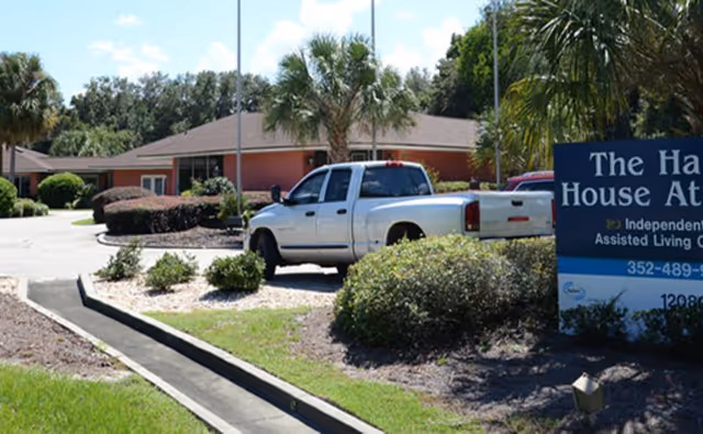 Exterior view of Harbor House of Ocala with a white pickup near the entrance.