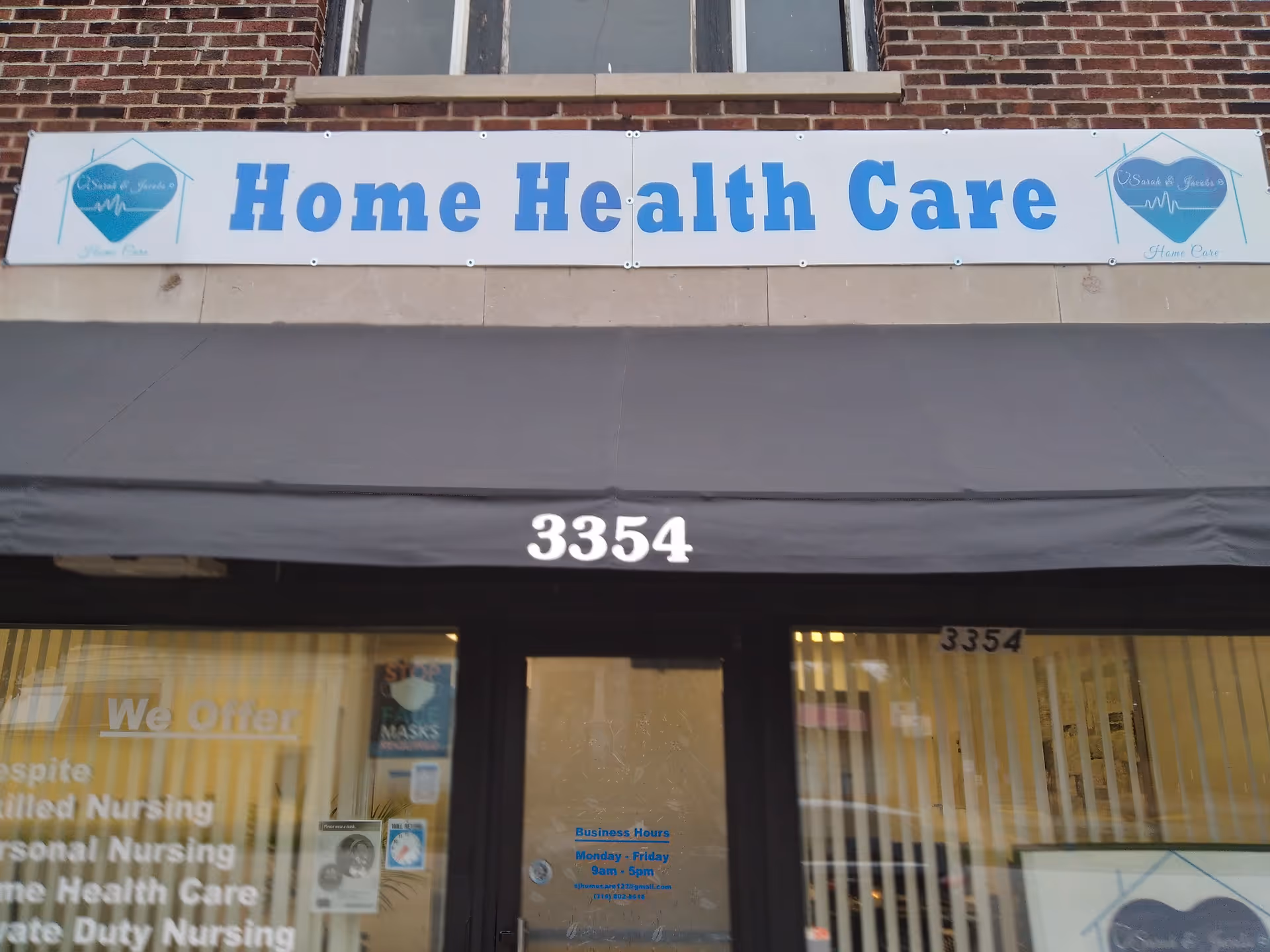 Front of a brick building with a large Home Health Care sign above the door.