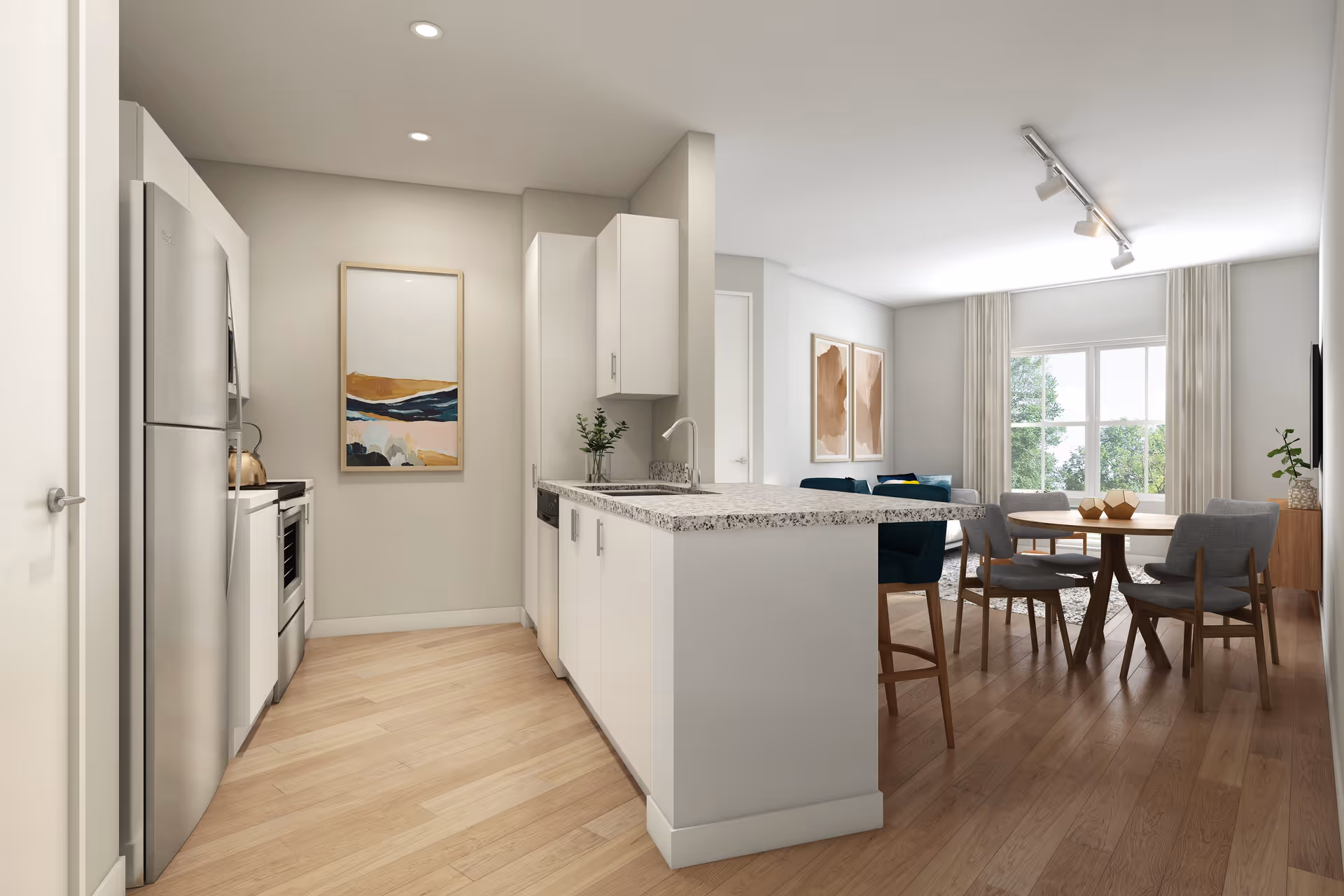 Modern kitchen with white cabinets, stainless steel refrigerator and oven, granite countertop island with sink, and a dining area with a round wooden table and four chairs. The room has wooden flooring, large windows with curtains, and abstract artwork on the walls.