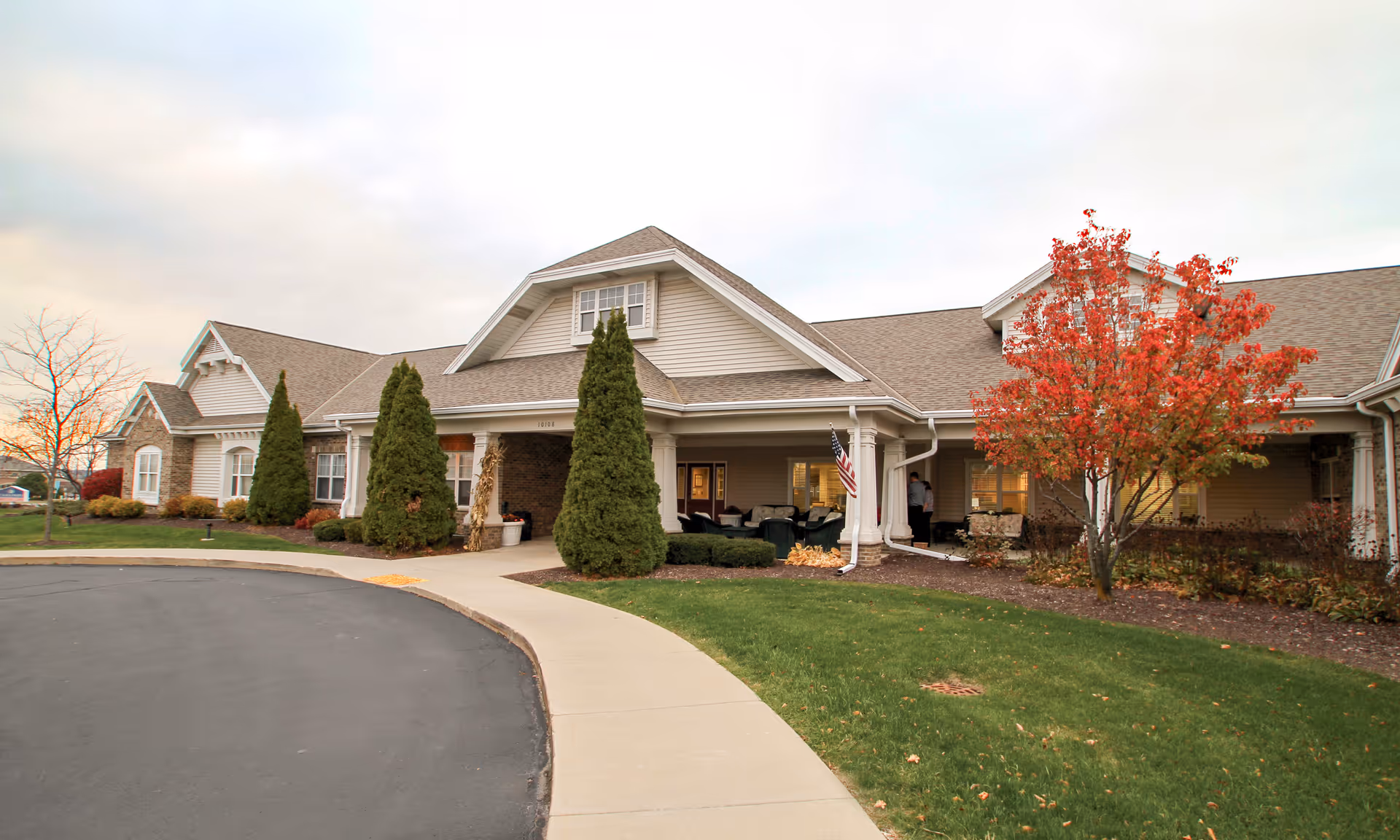 Exterior view of Brookdale Kenosha with a covered entrance and landscaped grounds.
