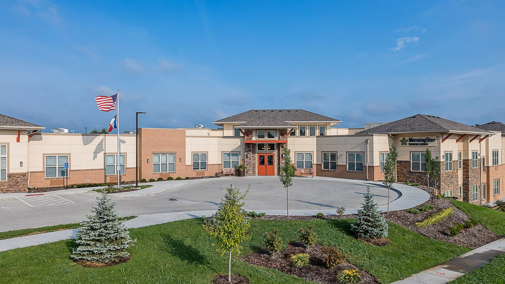 Exterior view of MorningStar at Jordan Creek showing the entrance and curved driveway.