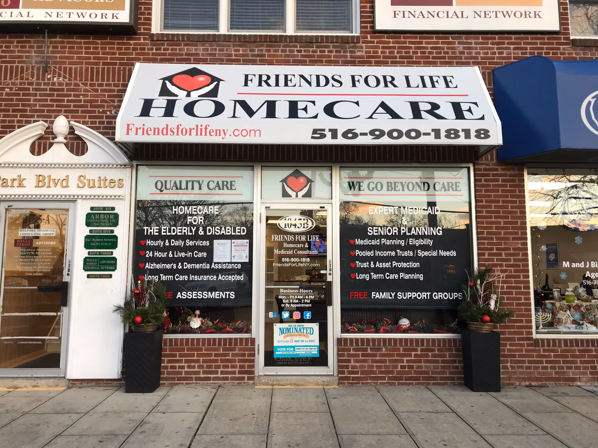 Front of a brick building with Friends For Life Homecare sign and service windows