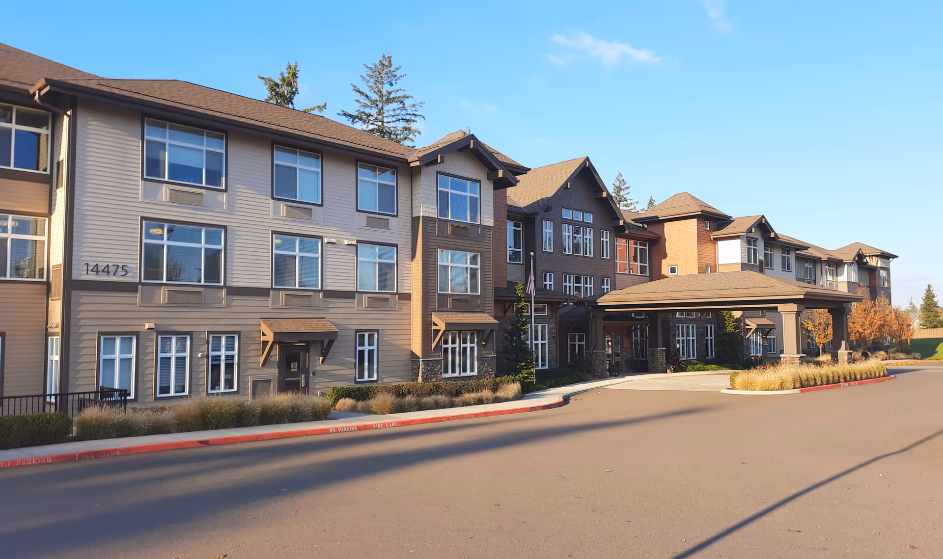 Exterior view of Morning Star of Beaverton senior living facility with entrance canopy.