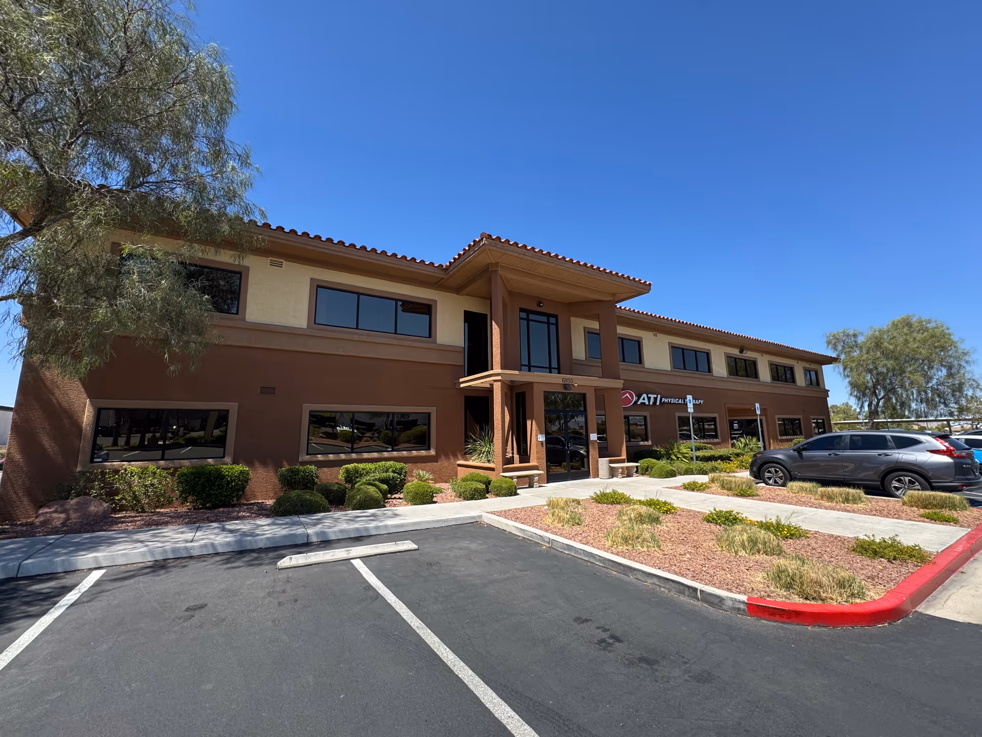 Front view of Haven Personal Care Services building with large windows and parking.