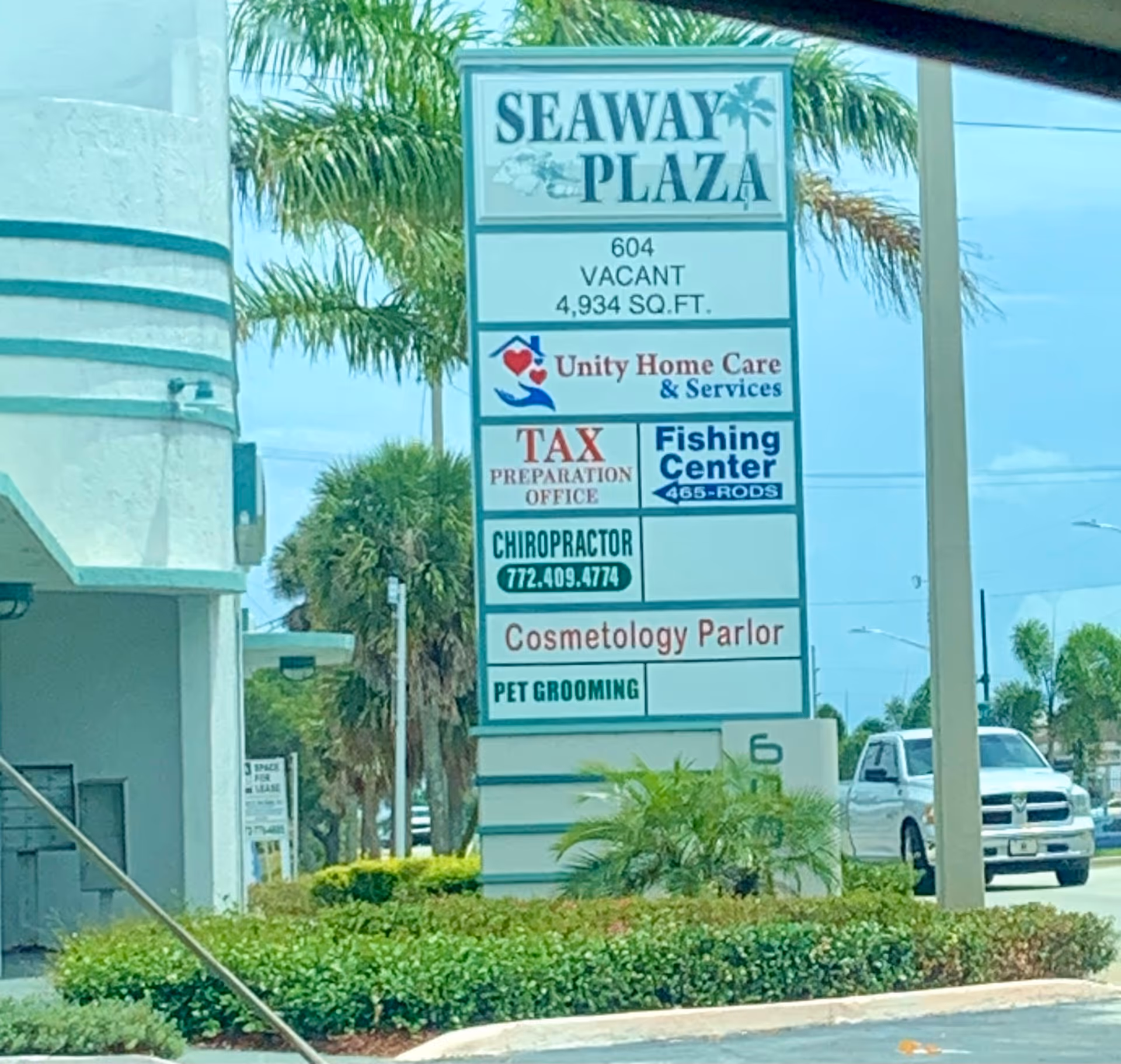 Outdoor sign at Seaway Plaza featuring Unity Home Care & Services LLC among other tenants.