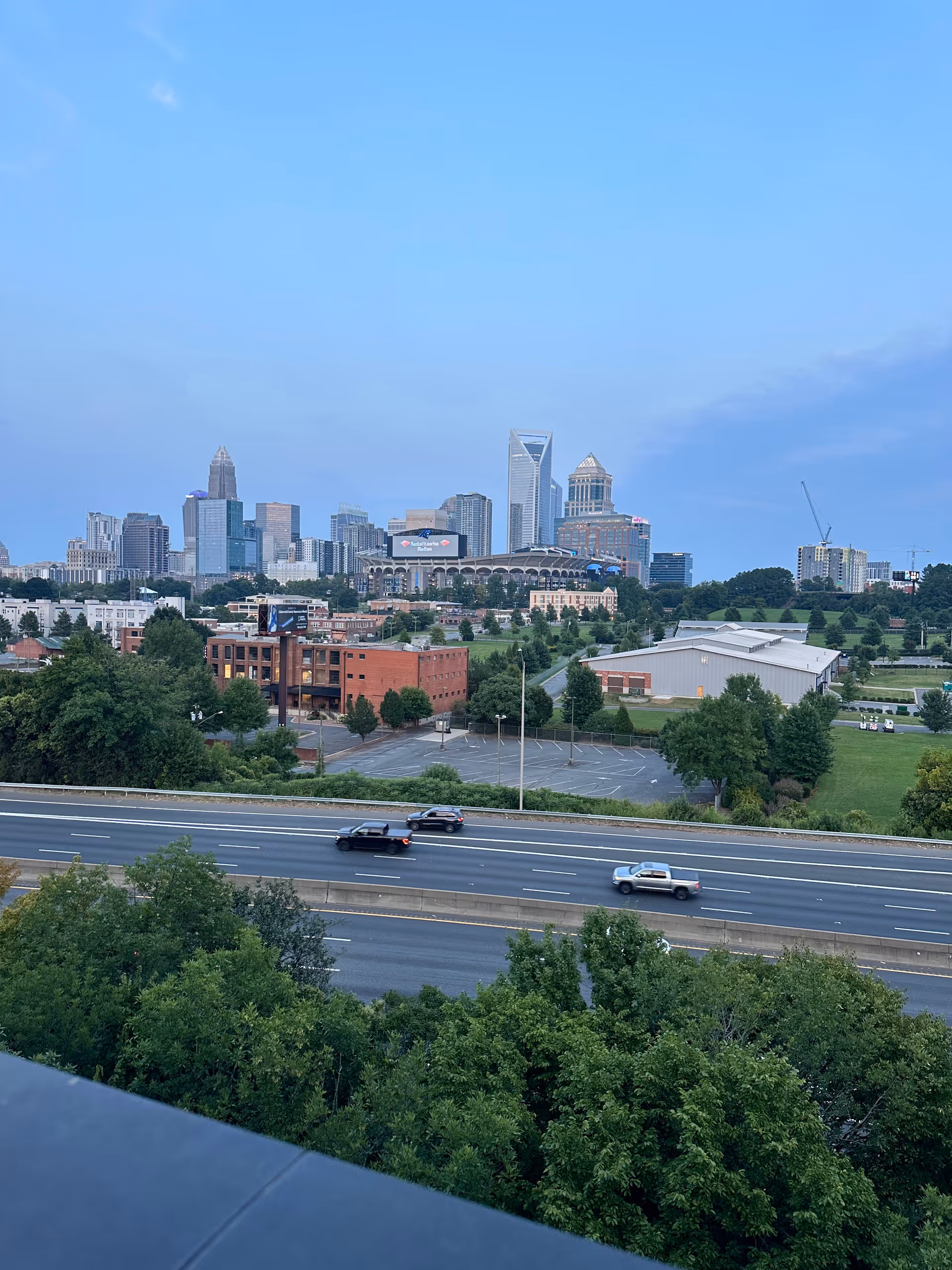 Charlotte skyline and highway view from a high vantage point.