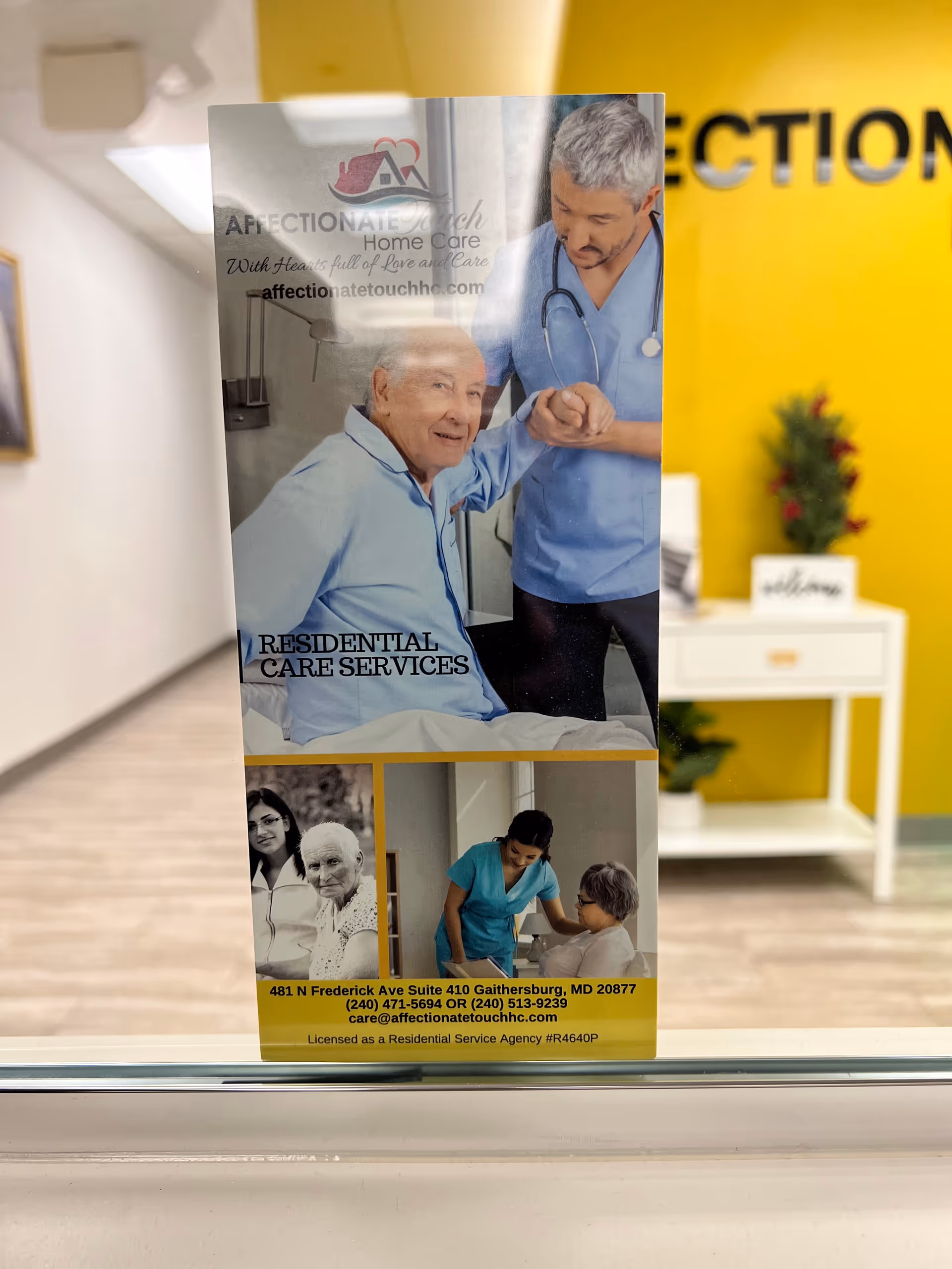 Indoor lobby with a brochure promoting Affectionate Touch Home Care services