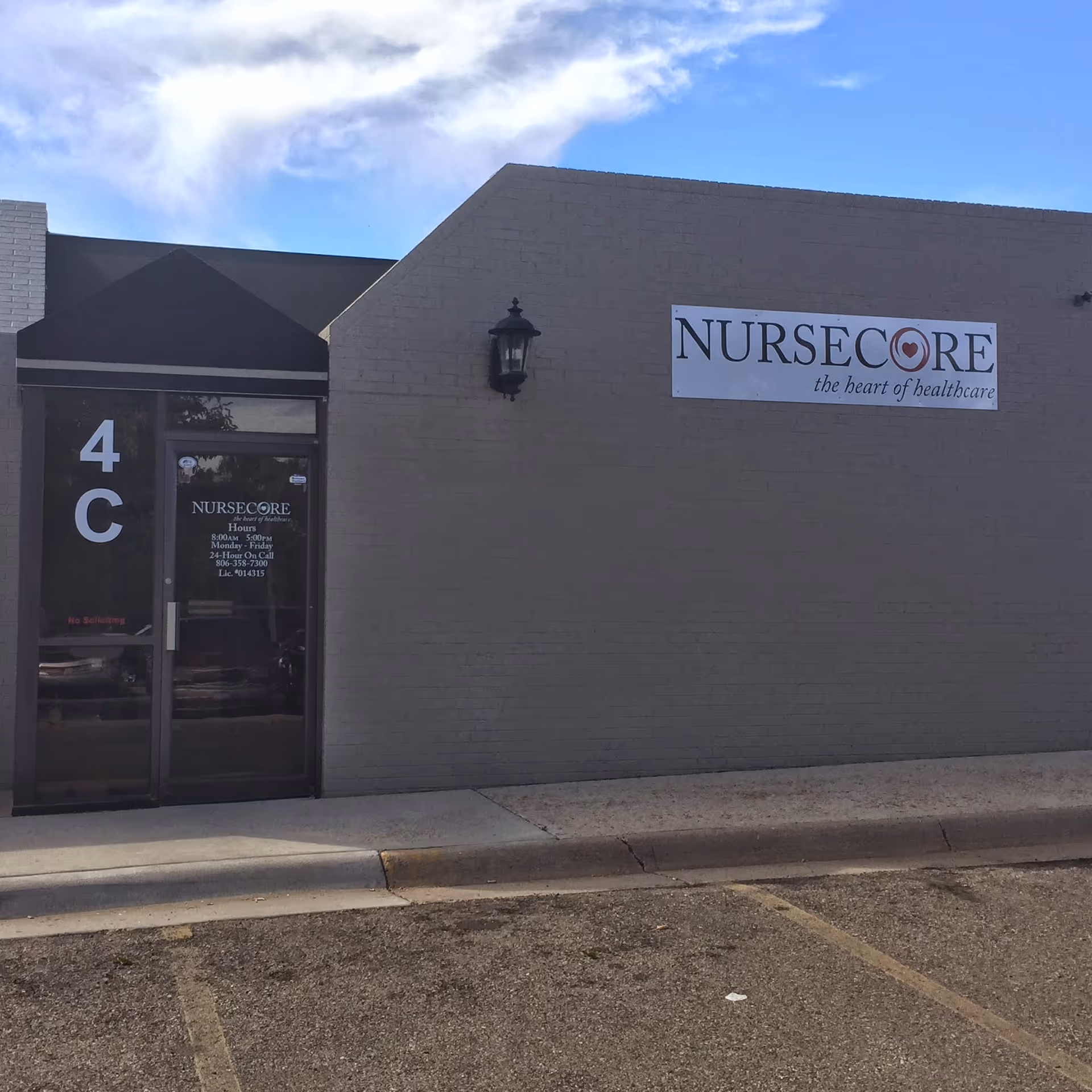 Exterior view of NurseCore building with sign and entrance labeled 4C in Amarillo