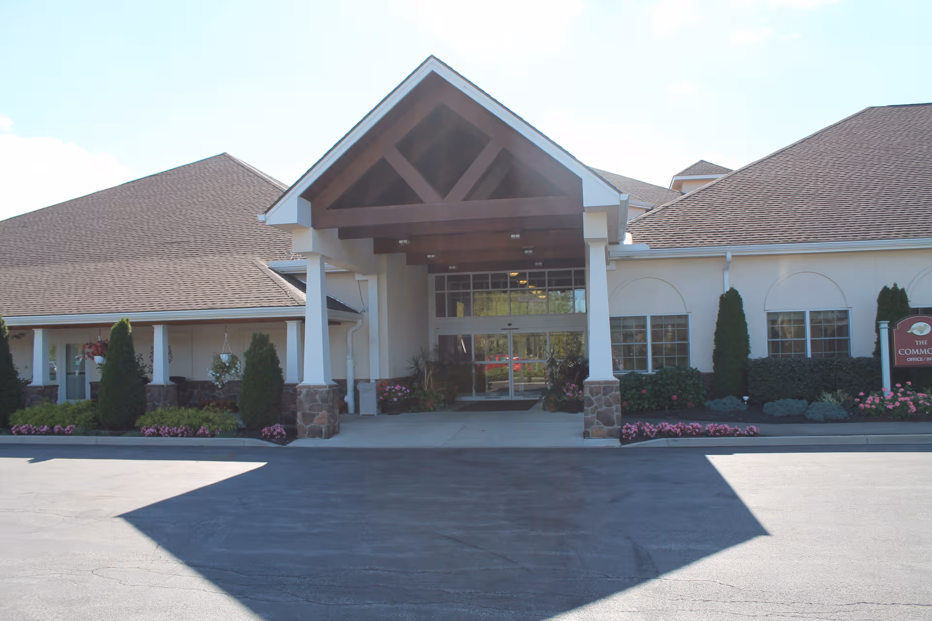 Exterior view of Fox Run at Orchard Park entrance with landscaping.