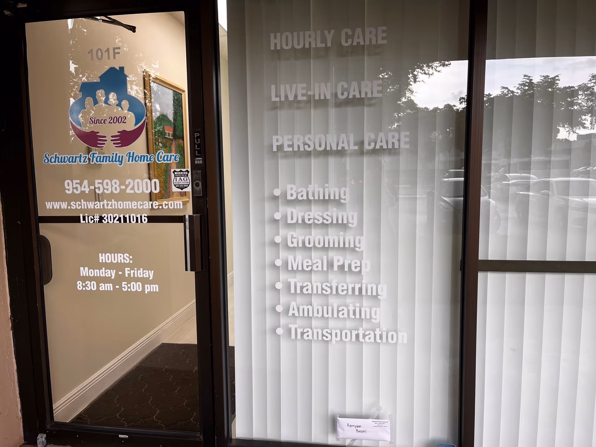 Glass storefront entrance for Schwartz Family Home Care with logo, hours, and services.