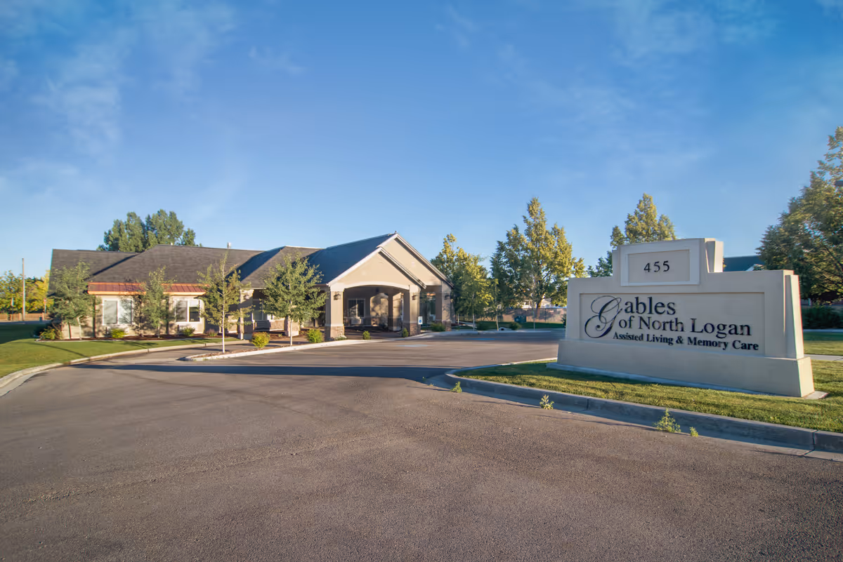 Exterior view of The Gables Assisted Living of North Logan with entrance.