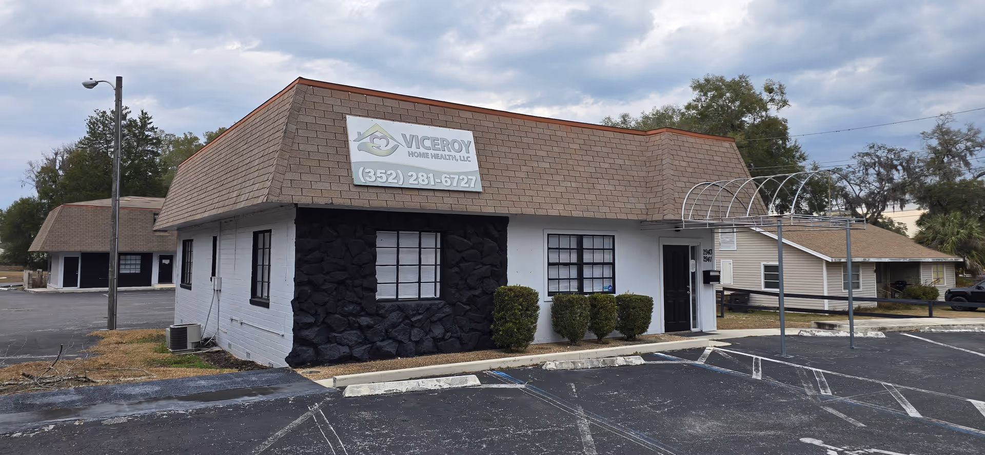 A single-story facility with a Viceroy Home Health sign and parking lot.