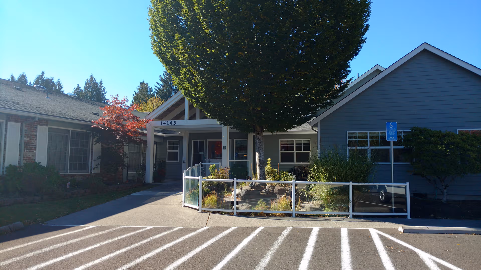 Front exterior view of Sapphire at Tigard Rehab with landscaped entry and parking.