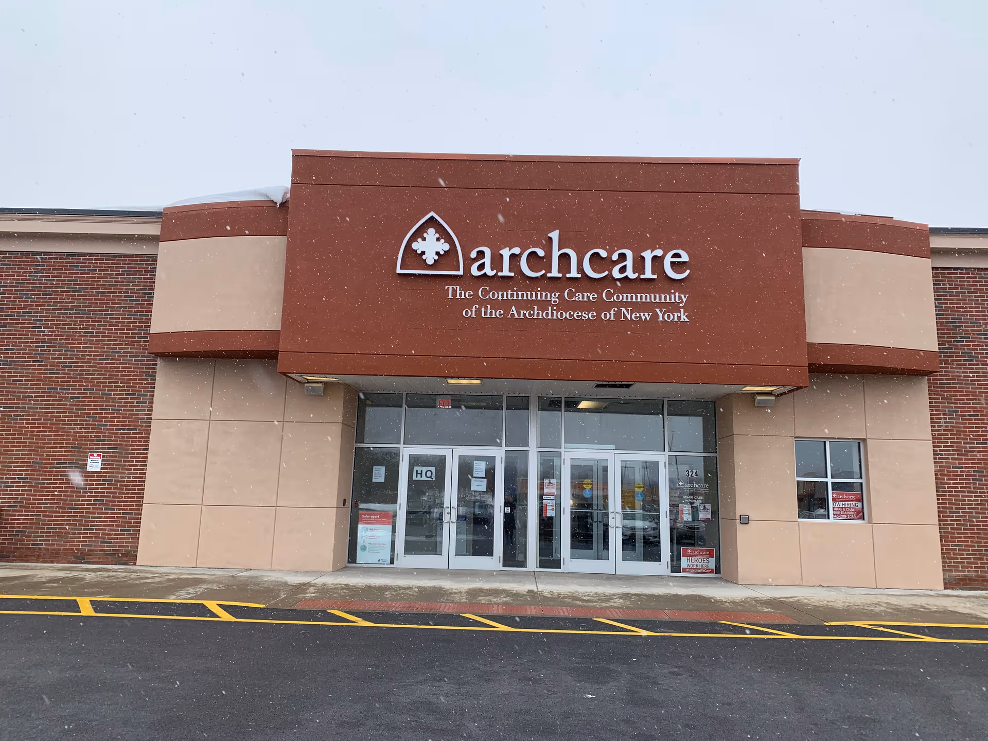Exterior view of ArchCare at Home building entrance with sign