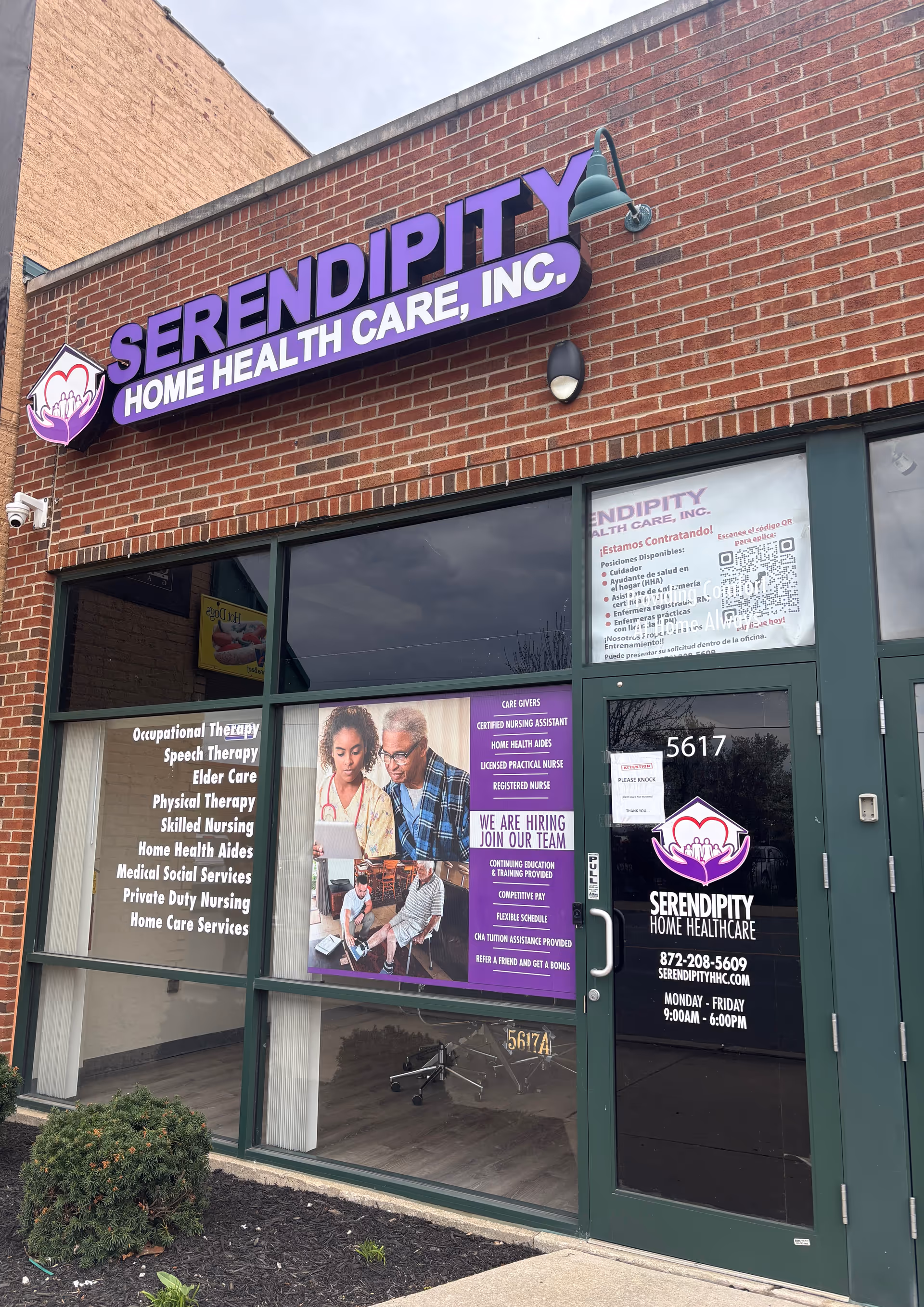 Exterior view of Serendipity Home Health Care storefront with purple sign.