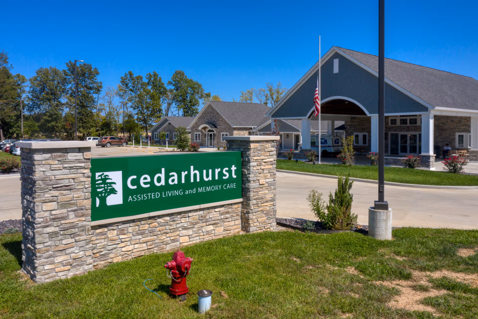 Cedarhurst of Lebanon exterior featuring stone sign and front entrance