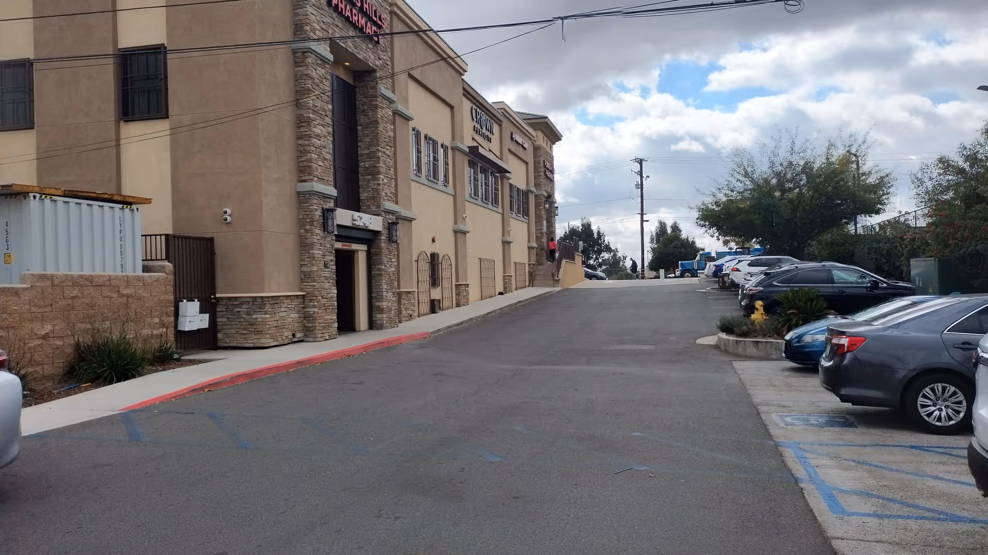 Exterior view of Perris Urgent Care clinic with parking along the front.